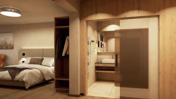 Ein modernes Schlafzimmer mit einem bequemen Bett und warmen Holztönen. Im Hintergrund befindet sich ein elegantes Badezimmer mit geschütztem Waschbereich. - Hotel Garni Hainbacherhof - Sölden