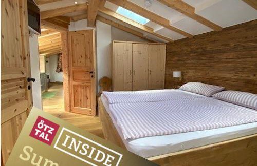 Schlafzimmer im Apartment Steinbock - HAUS ERIKA apartments - Sölden