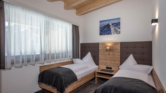 Schlafzimmer mit Einzelbetten - Apart Sonnhof - Sölden