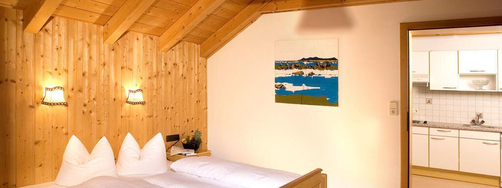 Schlafzimmer - Daheim Appartements - Huben