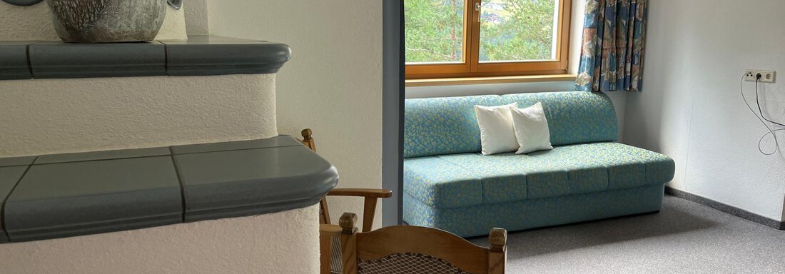 gemütlicher Wohnraum mit Kachelofen - Felsenhäusl - Sölden