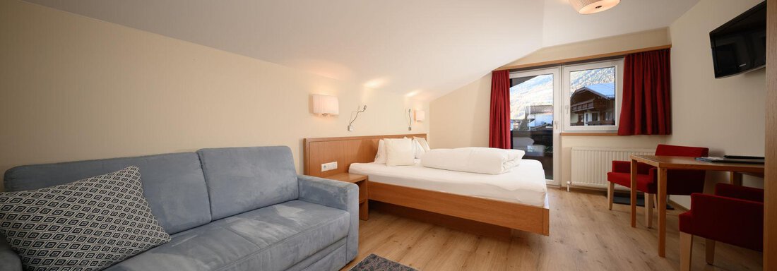 Junior Suite optisch getrennt Schlafbereich - Hotel Garni Maria Theresia - Sölden