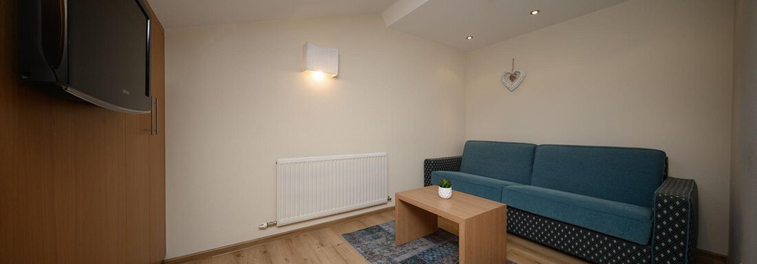 Junior Suite_Wohn-Schlafbereich Dachgeschoss - Hotel Garni Maria Theresia - Sölden