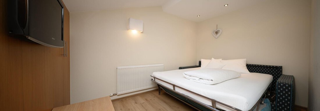 Junior Suite_Schlafbereich Dachgeschoss - Hotel Garni Maria Theresia - Sölden