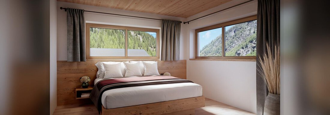 Ein modernes Schlafzimmer mit einem großen Bett und Holzelementen. Große Fenster bieten einen Blick auf die Natur. - Chalet s’Tyrolia - Zwieselstein